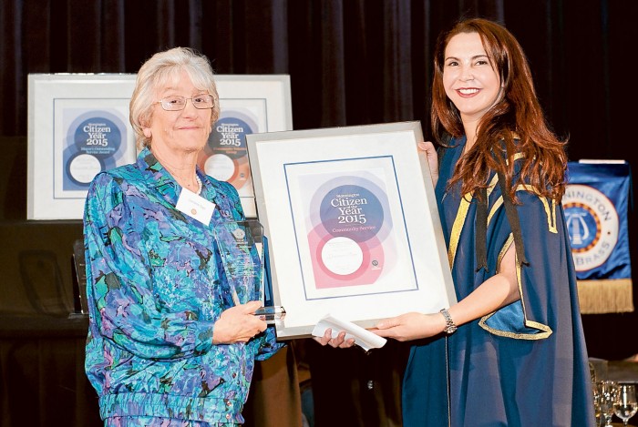 Stonnington mayor Melina Sehr (right) presents Lorraine Sage with her award