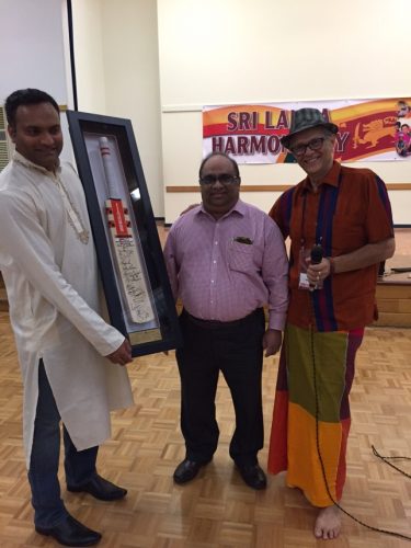 A cricket bat signed by the Sri Lankan team who were victorious against Australia this year was auctioned and raised $550 for the work to continue. 