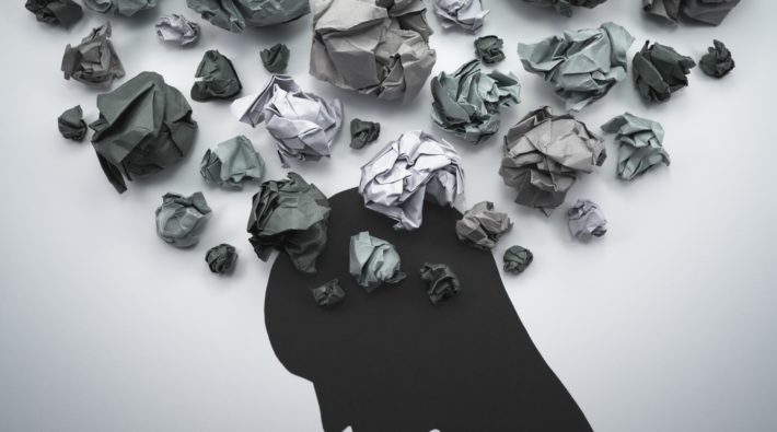 Silhouette of troubled person head.