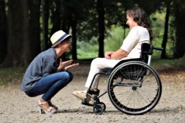 woman-on-black-folding-wheelchair-2026764